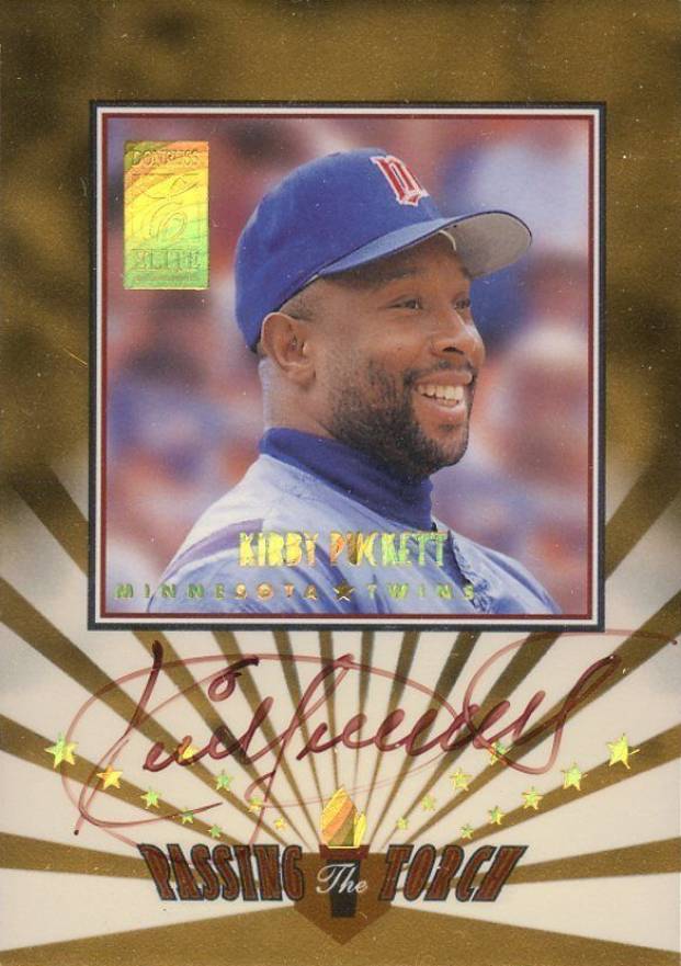 1997 Donruss Elite Passing the Torch Kirby Puckett/Andruw Jones #6 Baseball Card