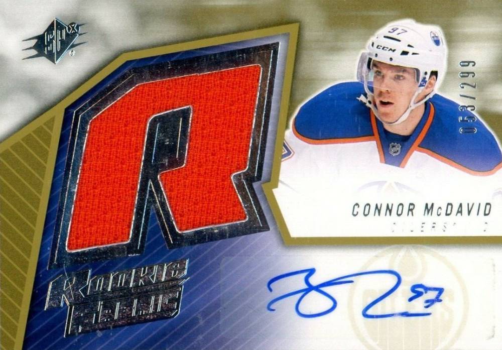 2015 SPx 2005-06 Retro Rookie Fabric Connor McDavid #CM Hockey Card